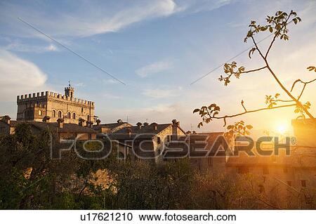 Sun shining on village houses View Large Photo Image Stock Image - Sun shining on village houses. Fotosearch