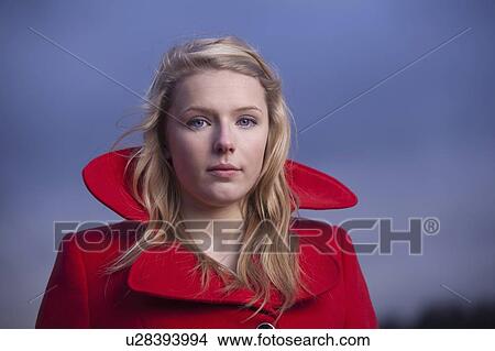 Teenage girl wearing coat outdoors View Large Photo Image Picture - Teenage girl wearing coat outdoors. Fotosearch