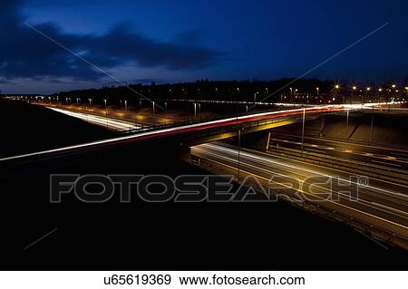 Time lapse view of traffic at night View Large Photo Image Stock Photo - Time lapse view of traffic at night. Fotosearch