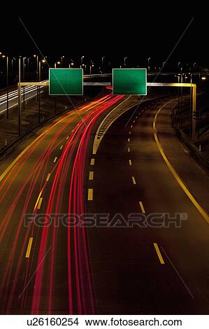 Time-lapse view of traffic on highway View Large Photo Image Picture - Time-lapse view of traffic on highway. Fotosearch