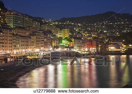 Urban coastline lit up at night View Large Photo Image Stock Photo - Urban coastline lit up at night. Fotosearch