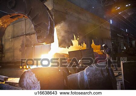 Welders at work in steel forge View Large Photo Image Stock Image - Welders at work in steel forge. Fotosearch