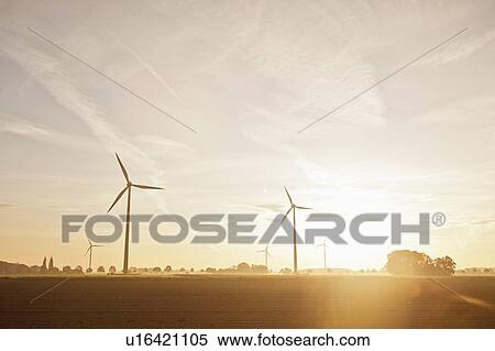 Wind turbines in rural landscape View Large Photo Image Stock Photography - Wind turbines in rural landscape. Fotosearch