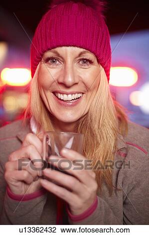 Woman drinking cup of coffee View Large Photo Image Stock Image - Woman drinking cup of coffee. Fotosearch