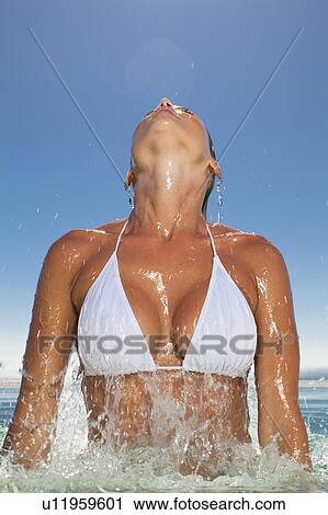 Woman emerging from swimming pool View Large Photo Image Stock Image - Woman emerging from swimming pool. Fotosearch