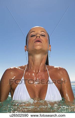 Woman emerging from swimming pool View Large Photo Image Stock Image - Woman emerging from swimming pool. Fotosearch
