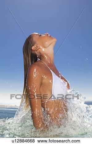 Woman emerging from swimming pool View Large Photo Image Stock Photo - Woman emerging from swimming pool. Fotosearch