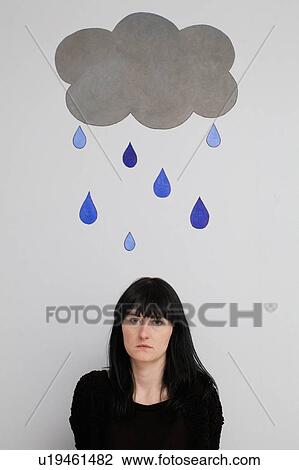 Woman standing under painted rain cloud View Large Photo Image Stock Image - Woman standing under painted rain cloud. Fotosearch