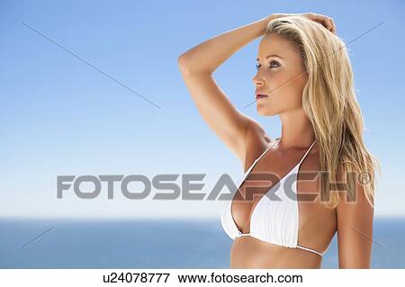 Woman wearing bikini outdoors View Large Photo Image Stock Photo - Woman wearing bikini outdoors. Fotosearch