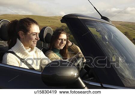 Women driving in rural landscape View Large Photo Image Stock Photo - Women driving in rural landscape. Fotosearch