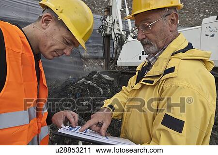 Workers at garbage collection center View Large Photo Image Stock Image - Workers at garbage collection center. Fotosearch