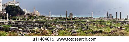 Stock Photography - Al Mina ruins, mosque in background. Fotosearch