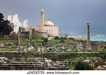 Stock Photography - Al Mina ruins, mosque in background. Fotosearch