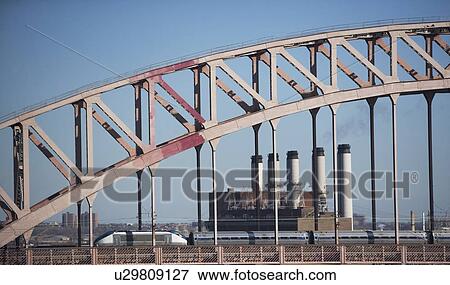 Bridge and smoke stacks View Large Photo Image Stock Photo - Bridge and smoke stacks. Fotosearch