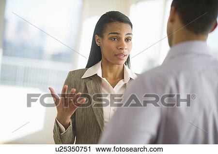 Business man and woman arguing View Large Photo Image Stock Image - Business man and woman arguing. Fotosearch