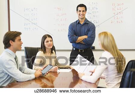 Stock Photograph - Business meeting. Fotosearch