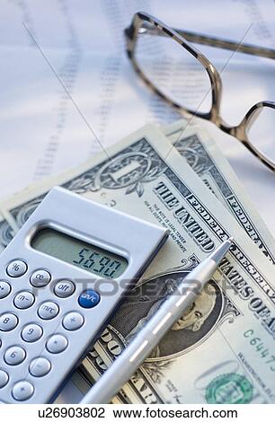 Calculator, pen and banknotes View Large Photo Image Stock Image - Calculator, pen and banknotes. Fotosearch