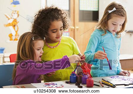 Children (2-3, 4-5, 6-7) during art classes View Large Photo Image Stock Photo - Children (2-3, 4-5, 6-7) during art classes. Fotosearch