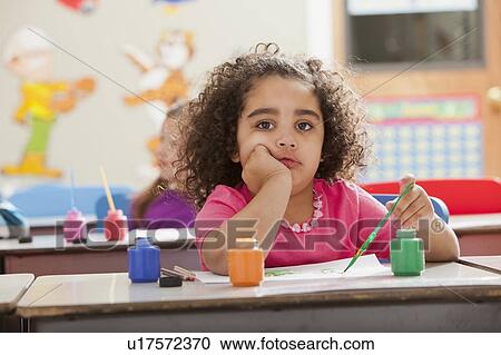 Stock Image - Children (2-3, 4-5) during art classes. Fotosearch