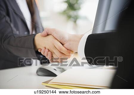 Close up of business people's shaking hands View Large Photo Image Picture - Close up of business people's shaking hands. Fotosearch
