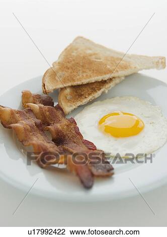 Stock Image - Close up of English breakfast, studio shot. Fotosearch