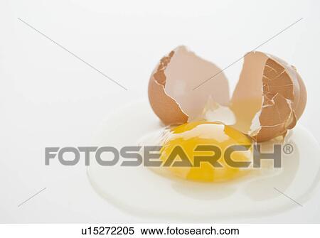 Close up of fried egg with cracked eggshell View Large Photo Image Stock Photography - Close up of fried egg with cracked eggshell. Fotosearch