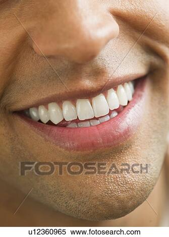 Close-up of man's perfect teeth View Large Photo Image Stock Photography - Close-up of man's perfect teeth. Fotosearch