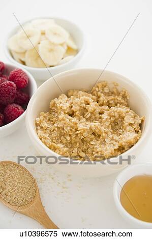 Close up of oats and fruits in bowls, studio shot View Large Photo Image Stock Photography - Close up of oats and fruits in bowls, studio shot. Fotosearch