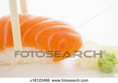 Close up of salmon meat and rice, studio shot View Large Photo Image Stock Photo - Close up of salmon meat and rice, studio shot. Fotosearch