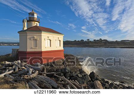 Stock Image - Coquille River, Small lighthouse. Fotosearch
