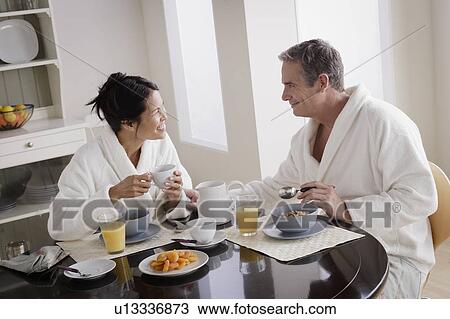 Couple having breakfast View Large Photo Image Stock Image - Couple having breakfast. Fotosearch