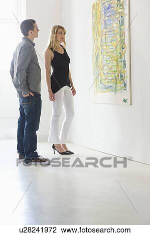 Couple in art gallery View Large Photo Image Stock Image - Couple in art gallery. Fotosearch