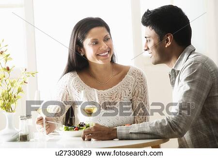 Stock Photo - Couple in restaurant. Fotosearch