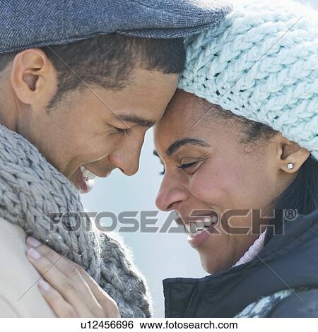 Stock Photograph - Couple in winter clothes. Fotosearch