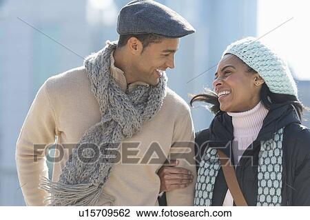 Couple walking in winter clothes View Large Photo Image Stock Image - Couple walking in winter clothes. Fotosearch