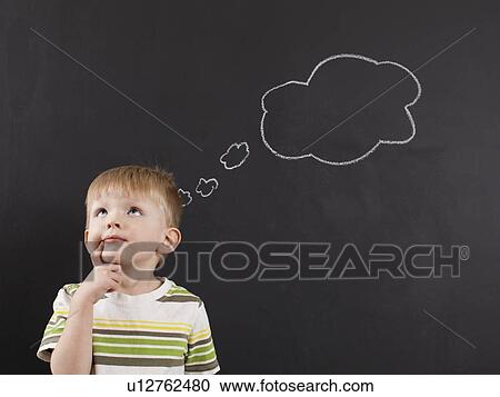 Cute toddler boy (2-3) standing against blackboard with thought bubble written in chalk View Large Photo Image Stock Image - Cute toddler boy (2-3) standing against blackboard with thought bubble written in chalk. Fotosearch