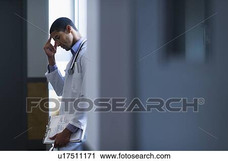 Doctor in corridor View Large Photo Image Stock Image - Doctor in corridor. Fotosearch