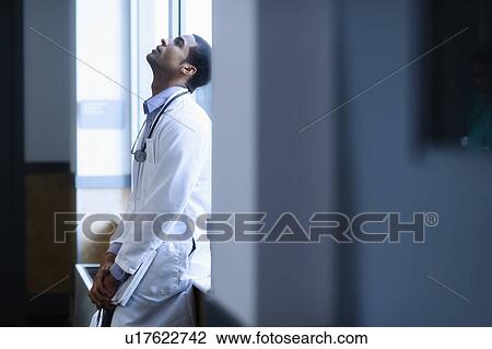 Doctor in corridor View Large Photo Image Stock Image - Doctor in corridor. Fotosearch