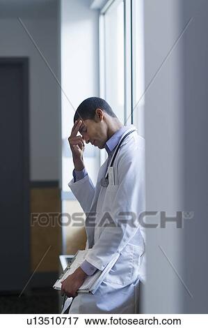 Doctor in corridor View Large Photo Image Stock Photo - Doctor in corridor. Fotosearch