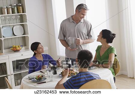 Family having breakfast together View Large Photo Image Stock Image - Family having breakfast together. Fotosearch