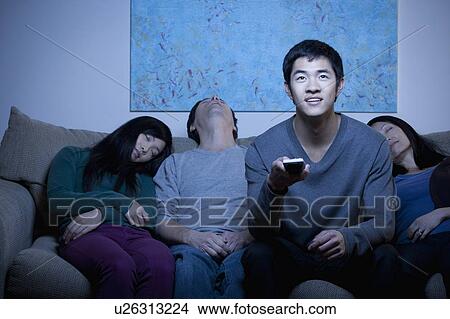 Family watching TV View Large Photo Image Picture - Family watching TV. Fotosearch