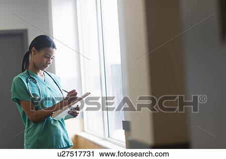 Stock Image - Female nurse in hospital. Fotosearch