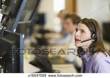 Female trader at trading desk View Large Photo Image Stock Photo - Female trader at trading desk. Fotosearch