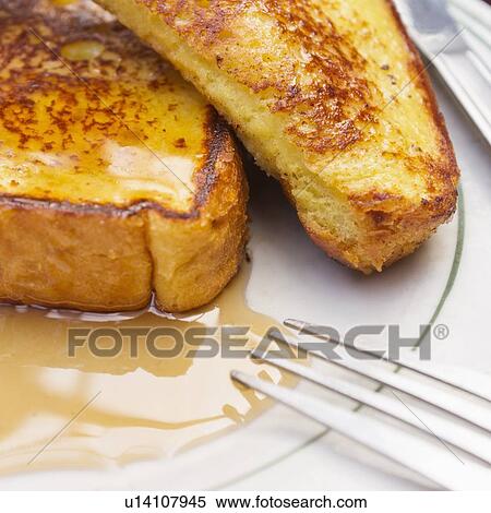Stock Photography - French toast with syrup. Fotosearch