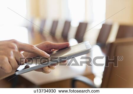 Hands of businesswoman using tablet pc View Large Photo Image Stock Image - Hands of businesswoman using tablet pc. Fotosearch
