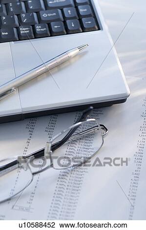 Stock Image - Laptop and glasses. Fotosearch