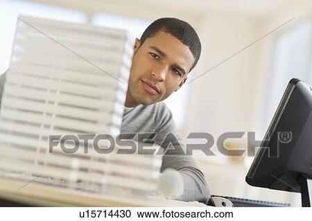 Stock Image - Male architect in office. Fotosearch