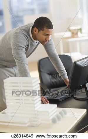 Male architect in office View Large Photo Image Stock Photo - Male architect in office. Fotosearch