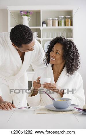 Mid adult couple at breakfast View Large Photo Image Stock Image - Mid adult couple at breakfast. Fotosearch