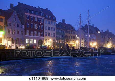 Stock Photo - Nyhavn district on early winter morning. Fotosearch